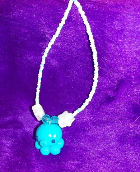 at0mik poulpe turkoize